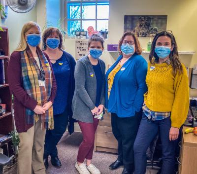 Bassett caregivers wear yellow and blue to show support for Ukraine