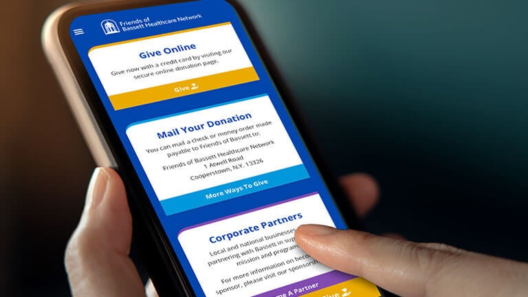 Friends of Bassett website being accessed on a mobile device