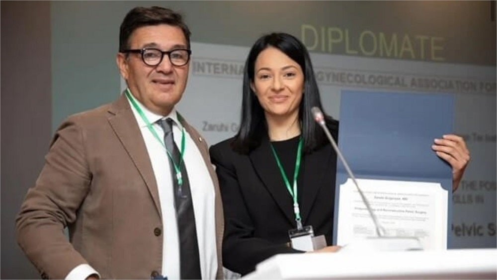 Dr. Samuel Badalian (left) issues a Urogynecology Diploma to Dr. Zaruhi Grigoryan of Armenia (right).