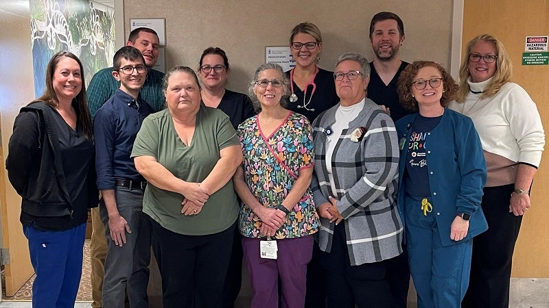 O’Connor Hospital leaders, team members, and caregivers gather to celebrate their Chartis Center for Rural Health Performance Leadership Award