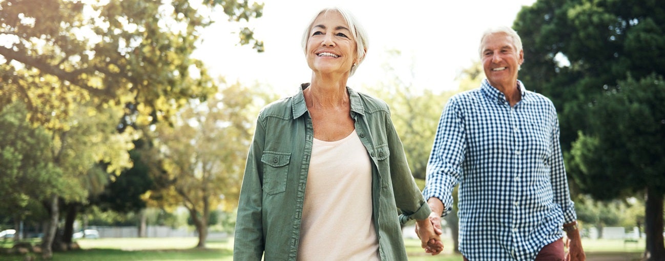 Man and woman walking in the park