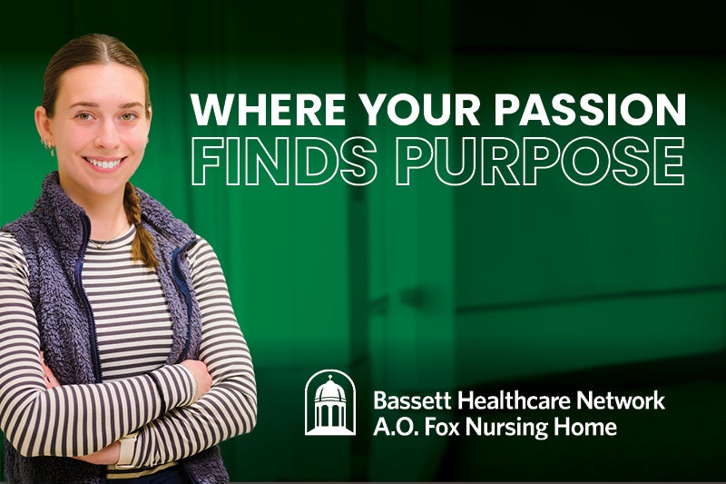 Bassett caregiver against a green clinical background with "Where your Passion Finds Purpose" text and the A.O. Fox Nursing Home logo