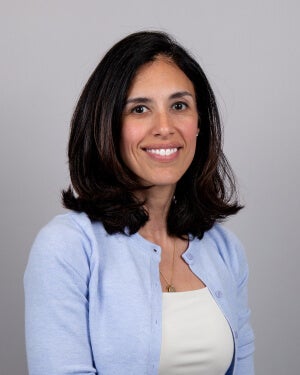 A photo of Dr. Nicole Betancourt, a woman with shoulder length hair