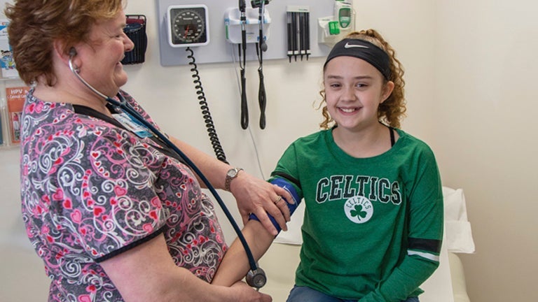 Sidney Central School-Based Health Practitioner Helping Student