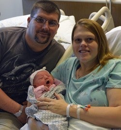 Baby Isabella with her parents