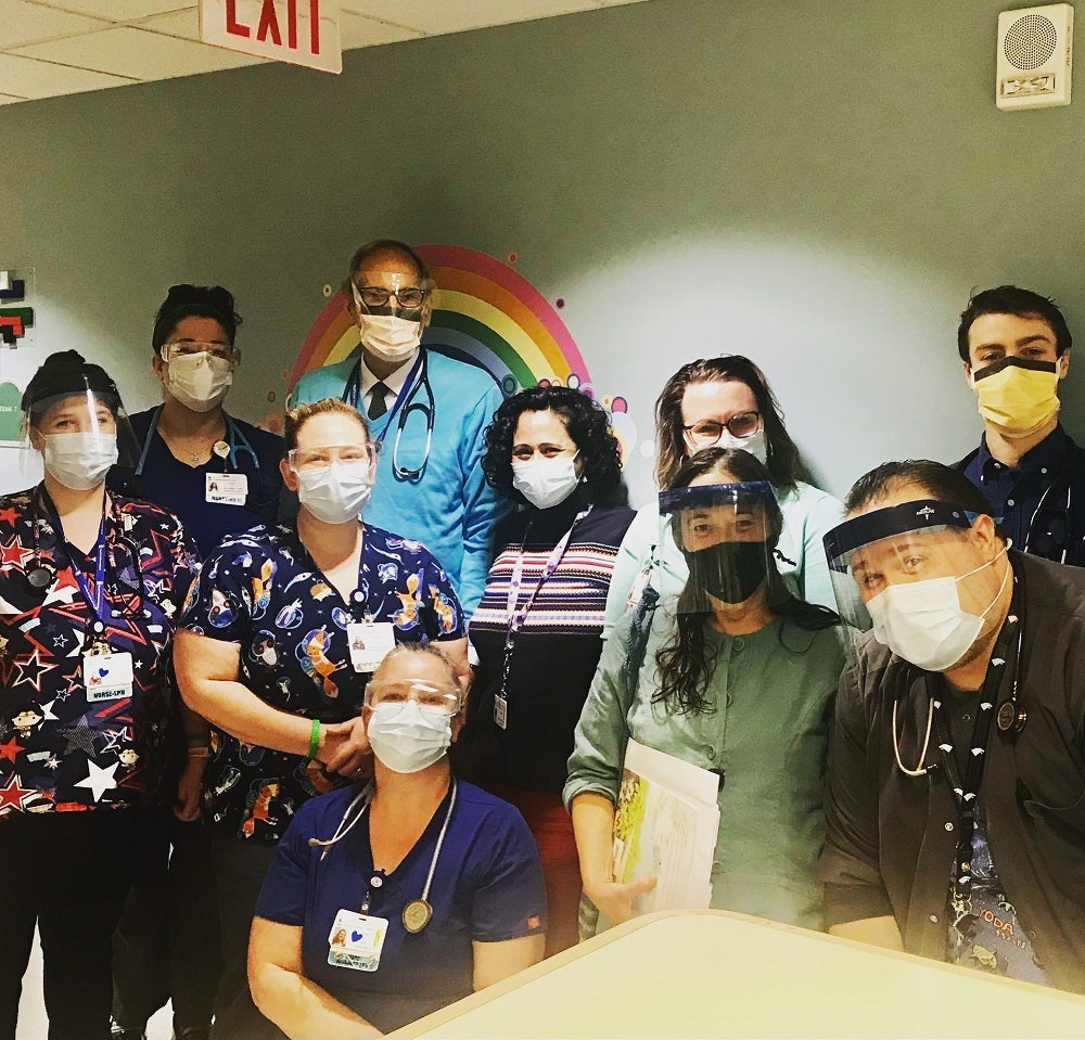 Dr. Kjolhede and his team wear blue and green for Donate Life Day.