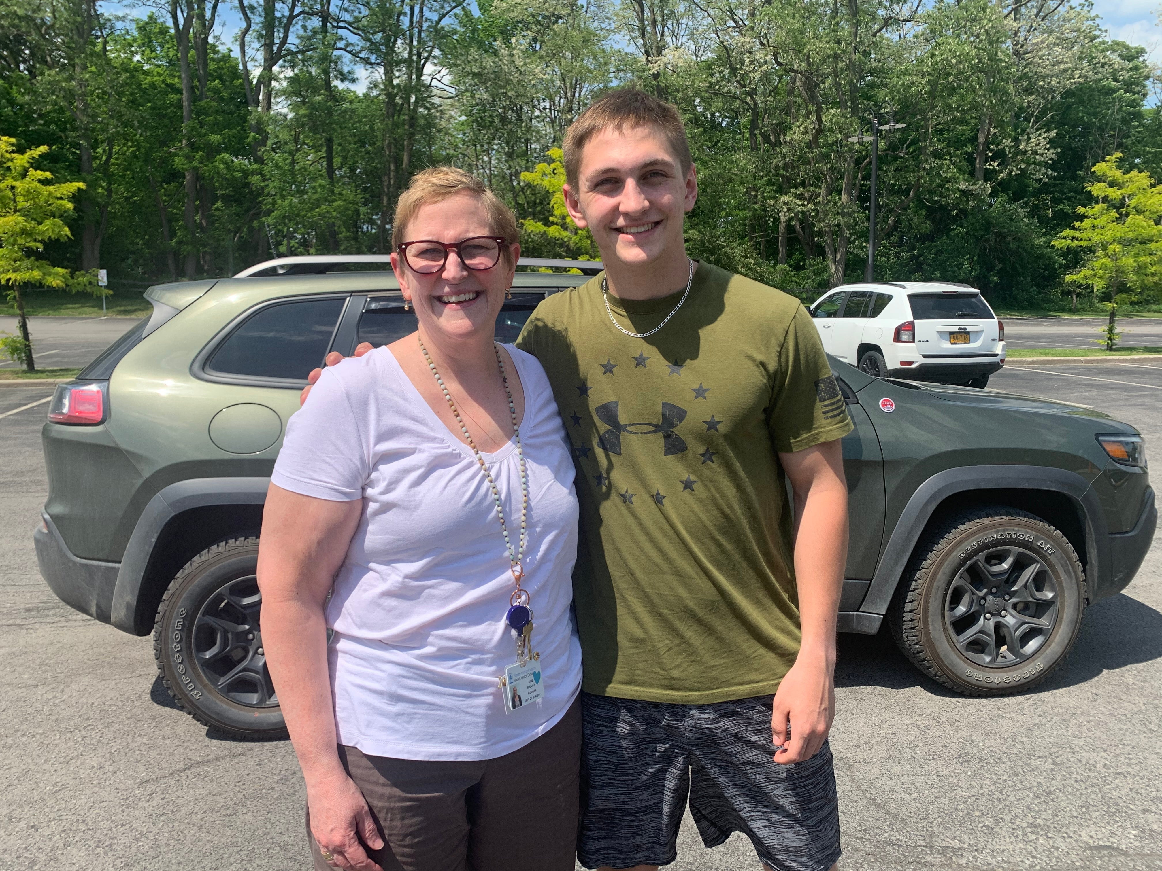 Bassett Cancer Institute Practitioner with son at event