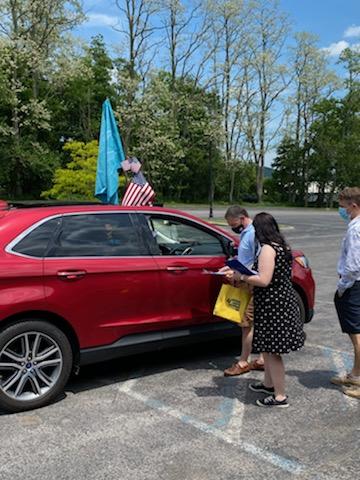 Bassett Cancer Institute Practitioners Giving Gift Bags to Patients