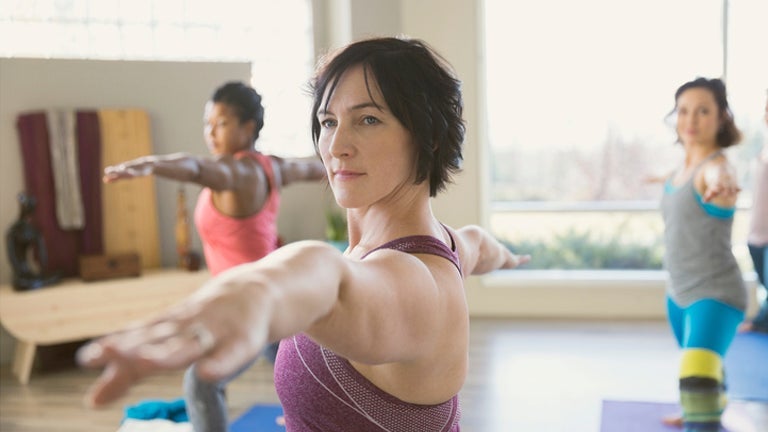 adult female in yoga class