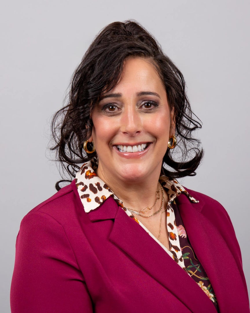 A woman, Jennifer Hecox is photographed.