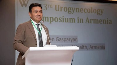 Dr. Badalian giving a speech at the symposium.